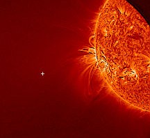 An image from NASA's Solar Dynamics Observatory that shows the sun, but no Comet ISON. The white plus sign is where the Comet would have appeared if it had survived the journey around the sun. Photo Credit: NASA/SDO [Public domain], via Wikimedia Commons