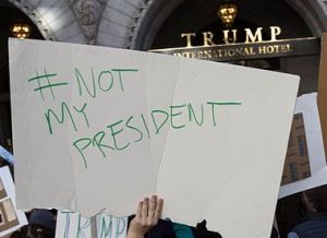 Not-My-President protest demonstration outside Trump Hotel in Washington DC, right after the election. Photo Credit: By Lorie Shaull [CC BY-SA 2.0], via Wikimedia Commons